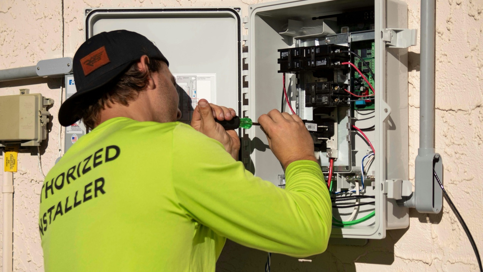 Solar and electrical technician on a job - the kind of home service work Speedset answers calls for