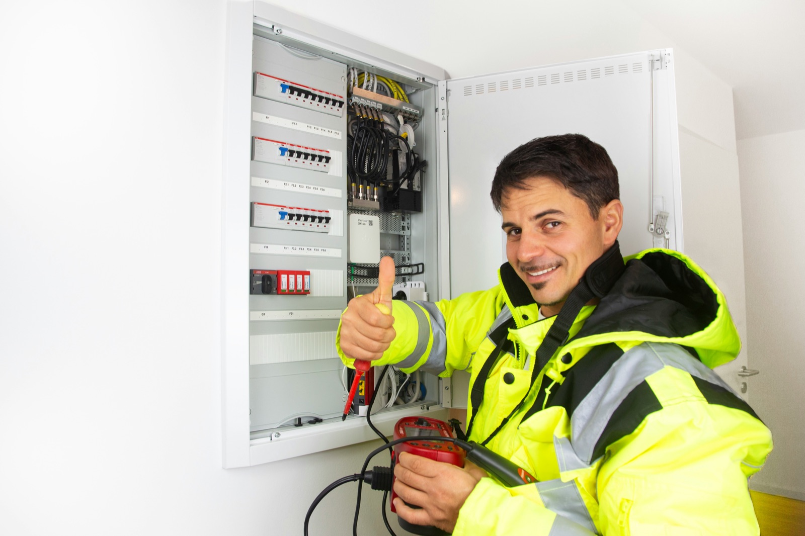 Home service professional working on a residential install